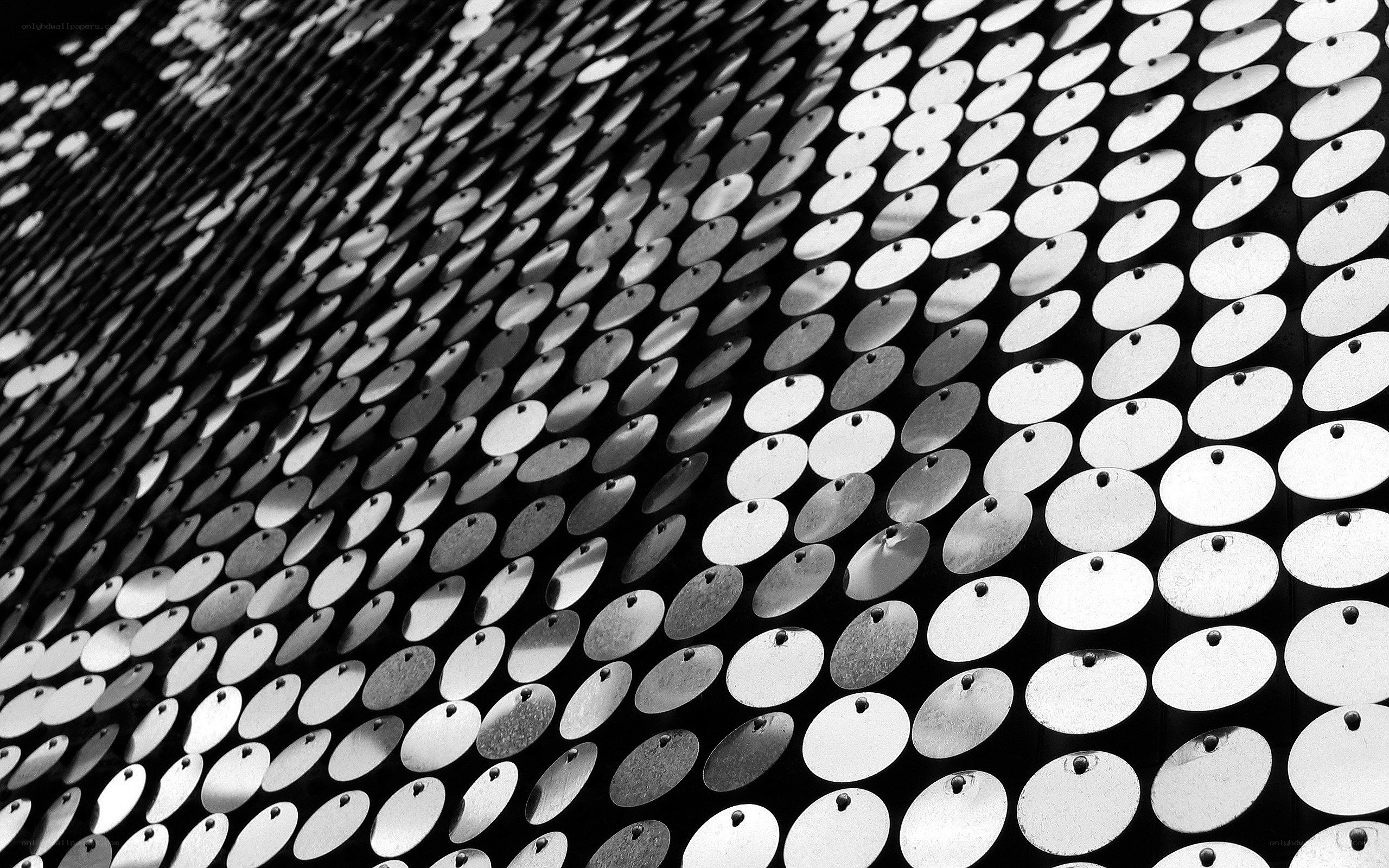 abstract pattern of metallic discs