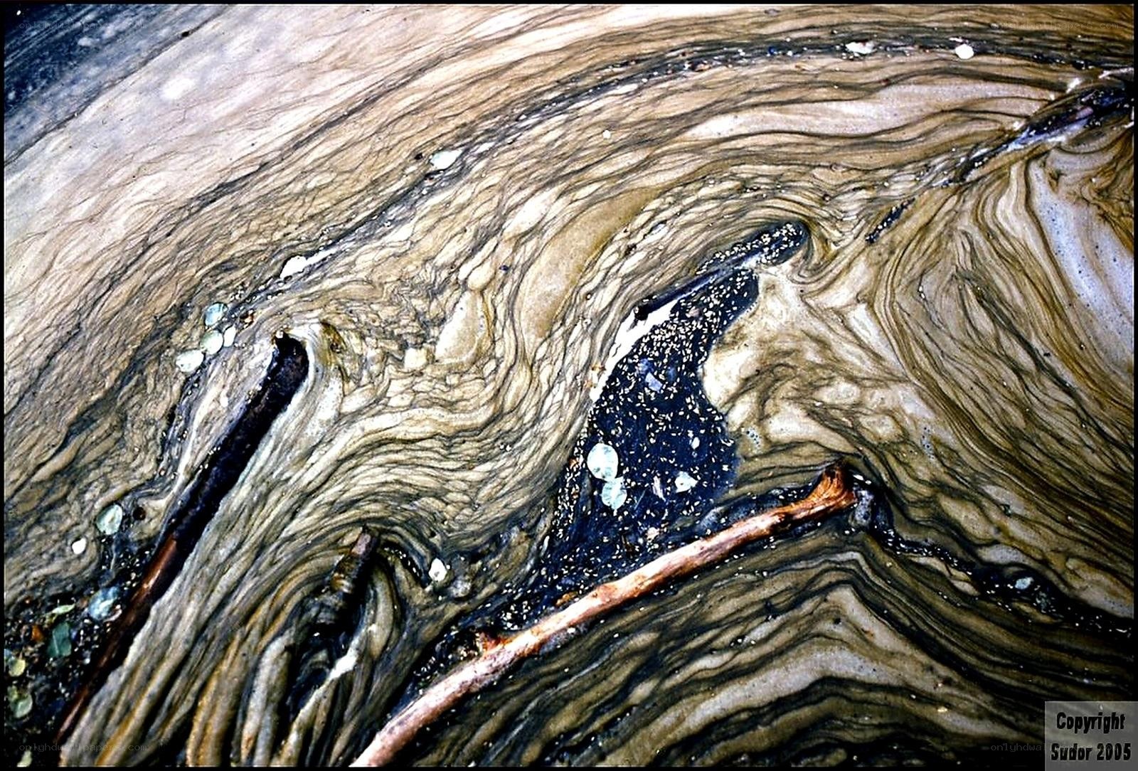 Abstract patterns on wet sand