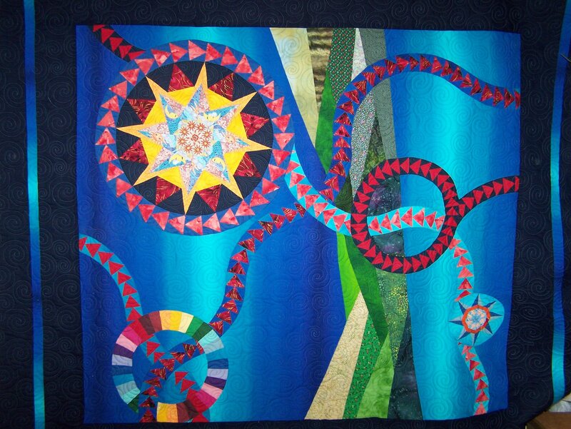 Abstract quilt with star and swirls