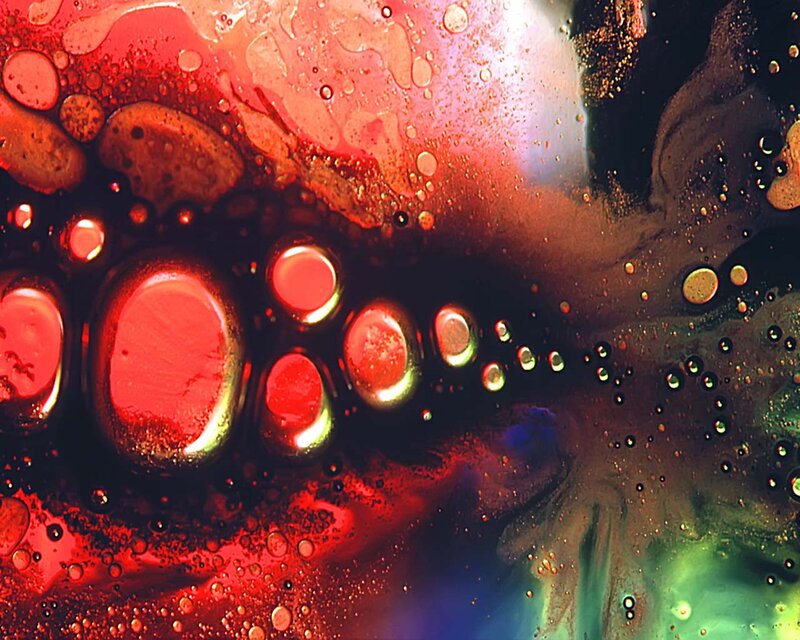 Abstract red and green fluid patterns