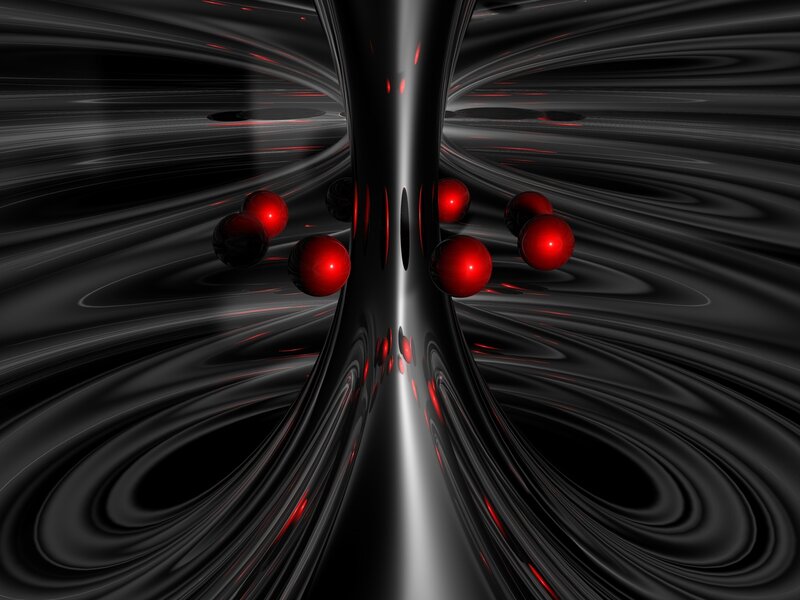 Abstract red spheres in dark tunnel