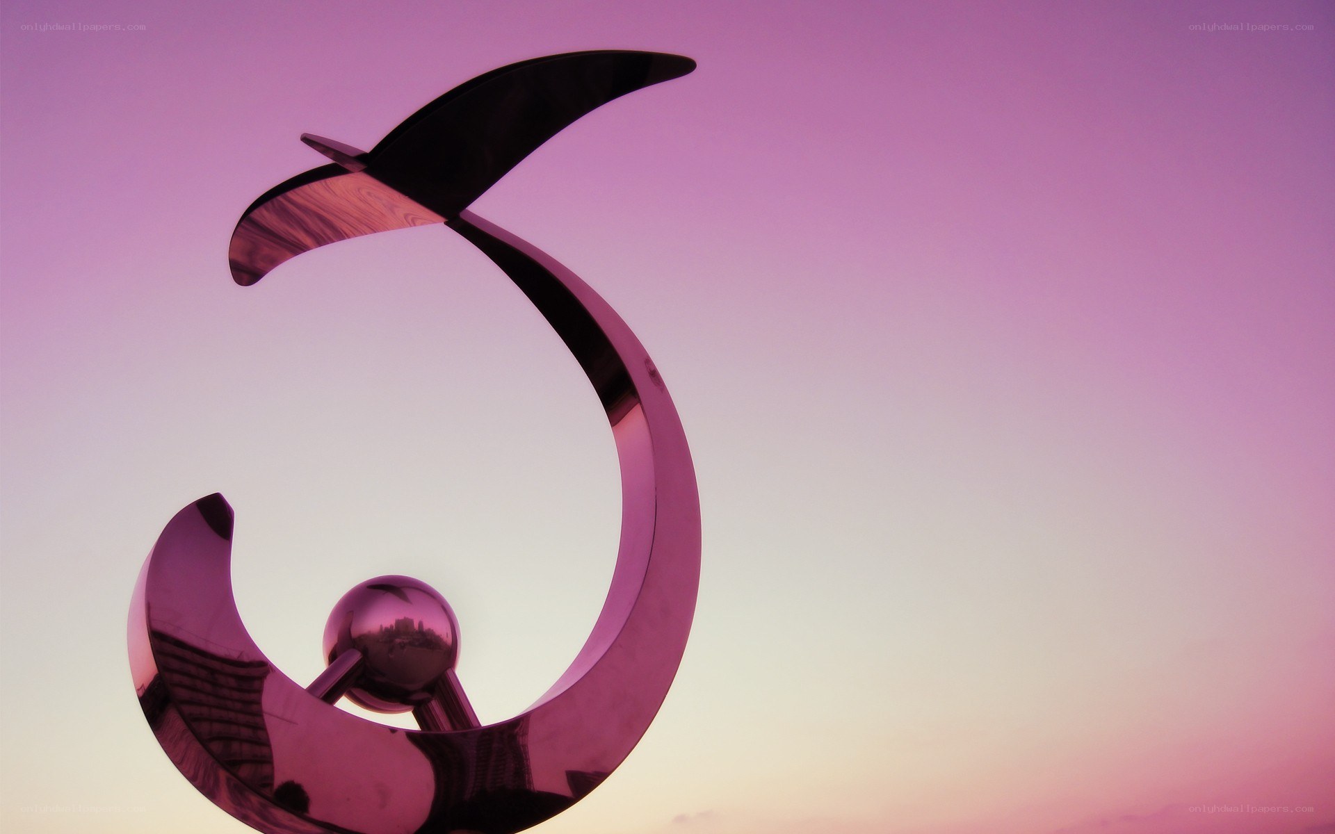 abstract sculpture at sunset