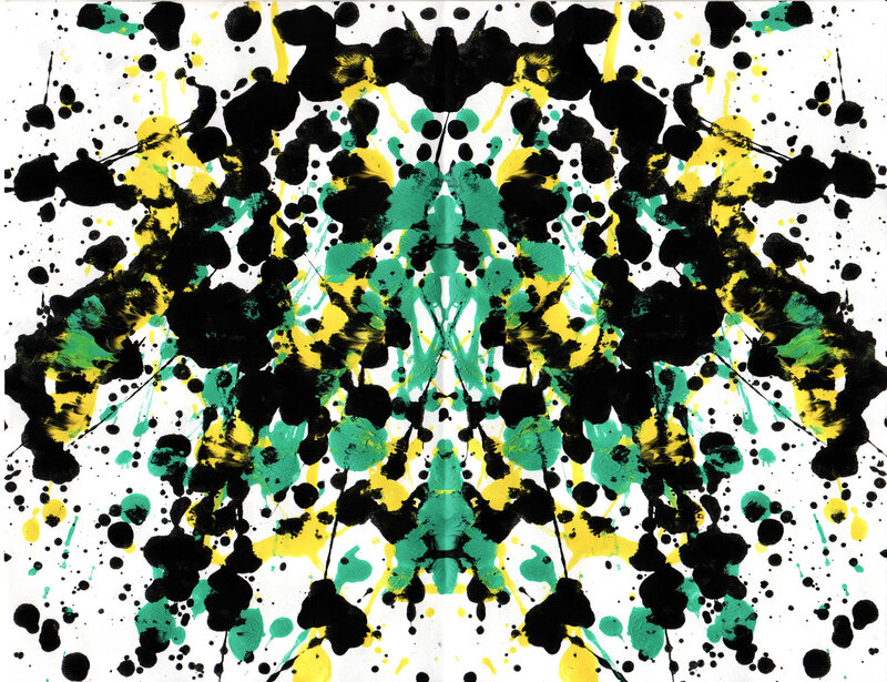Abstract splatter art with black yellow and green