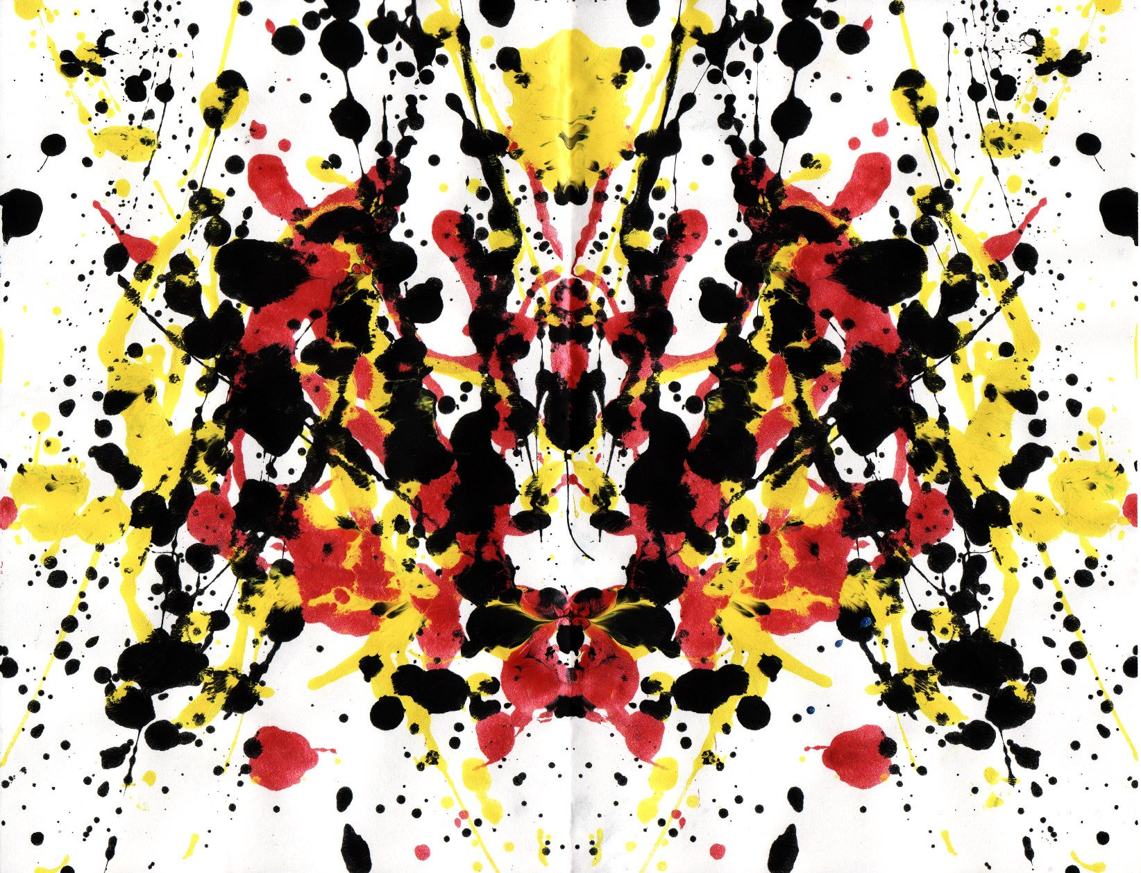 Abstract splatter art with red yellow black