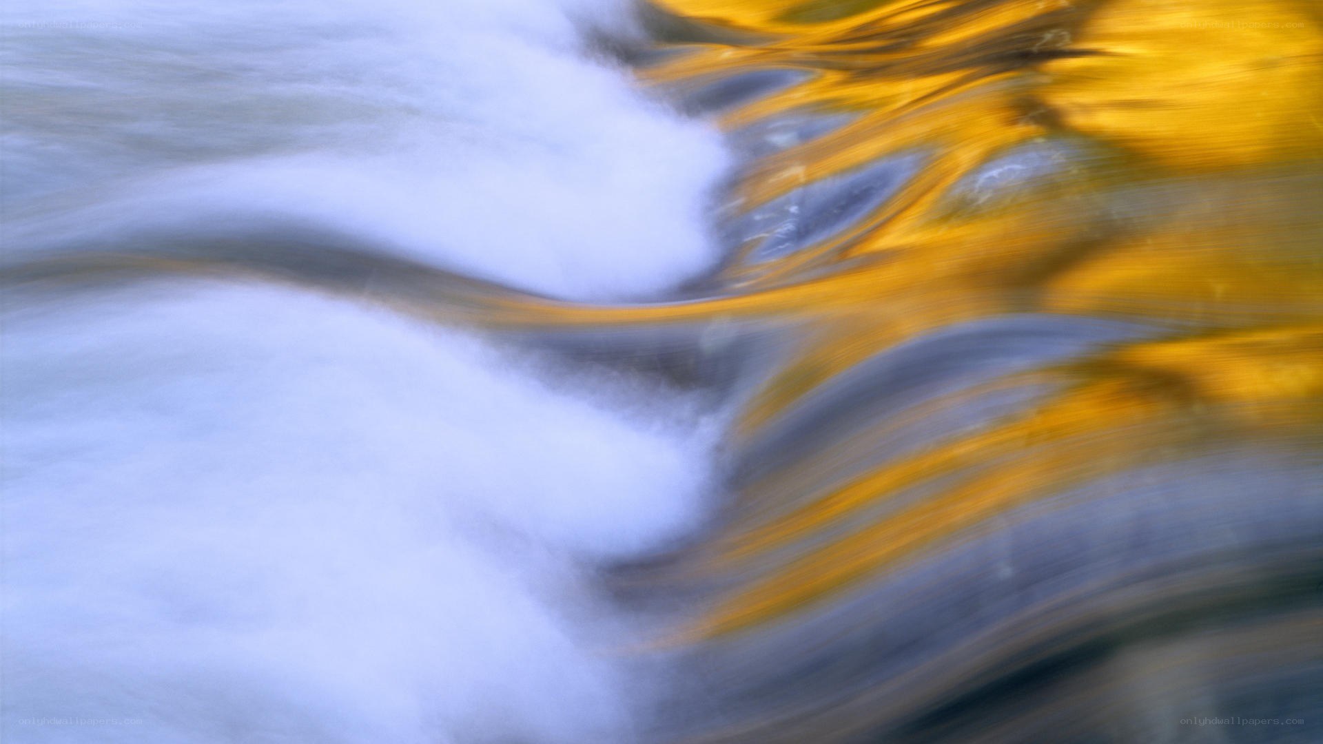 Abstract water flow with golden reflection