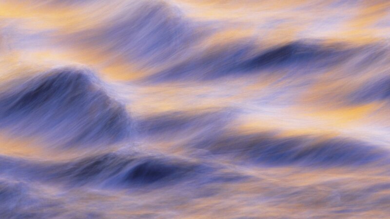 Abstract water motion at sunset