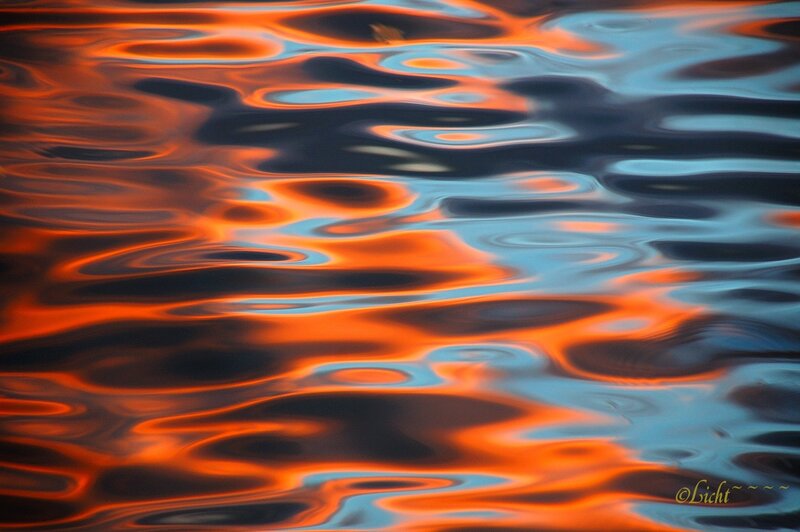 Abstract water reflections at sunset