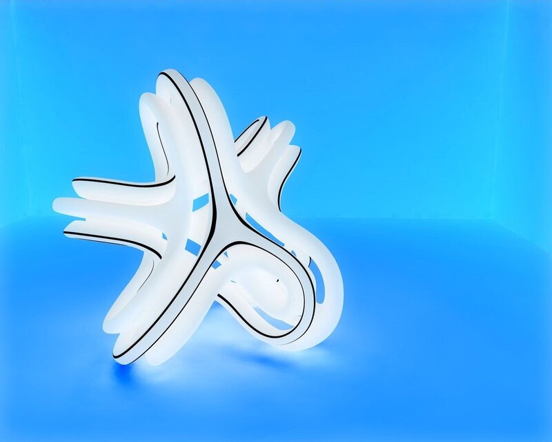 abstract white sculpture on blue