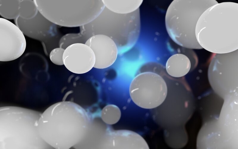 abstract white spheres in blue light