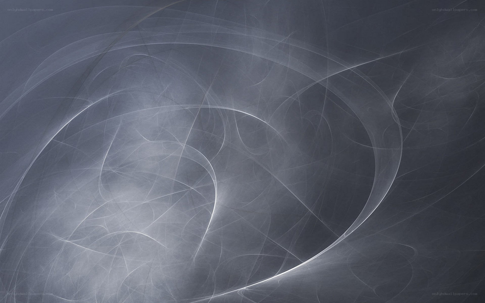 Abstract white swirls on dark background