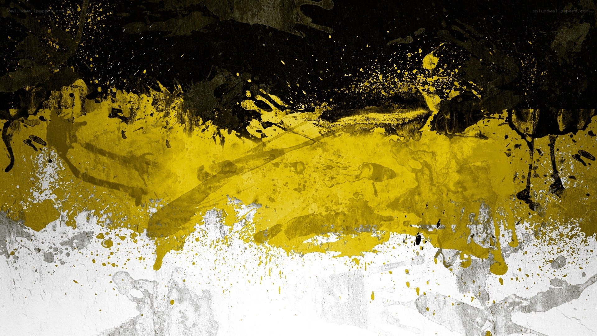 abstract yellow and black paint splatter