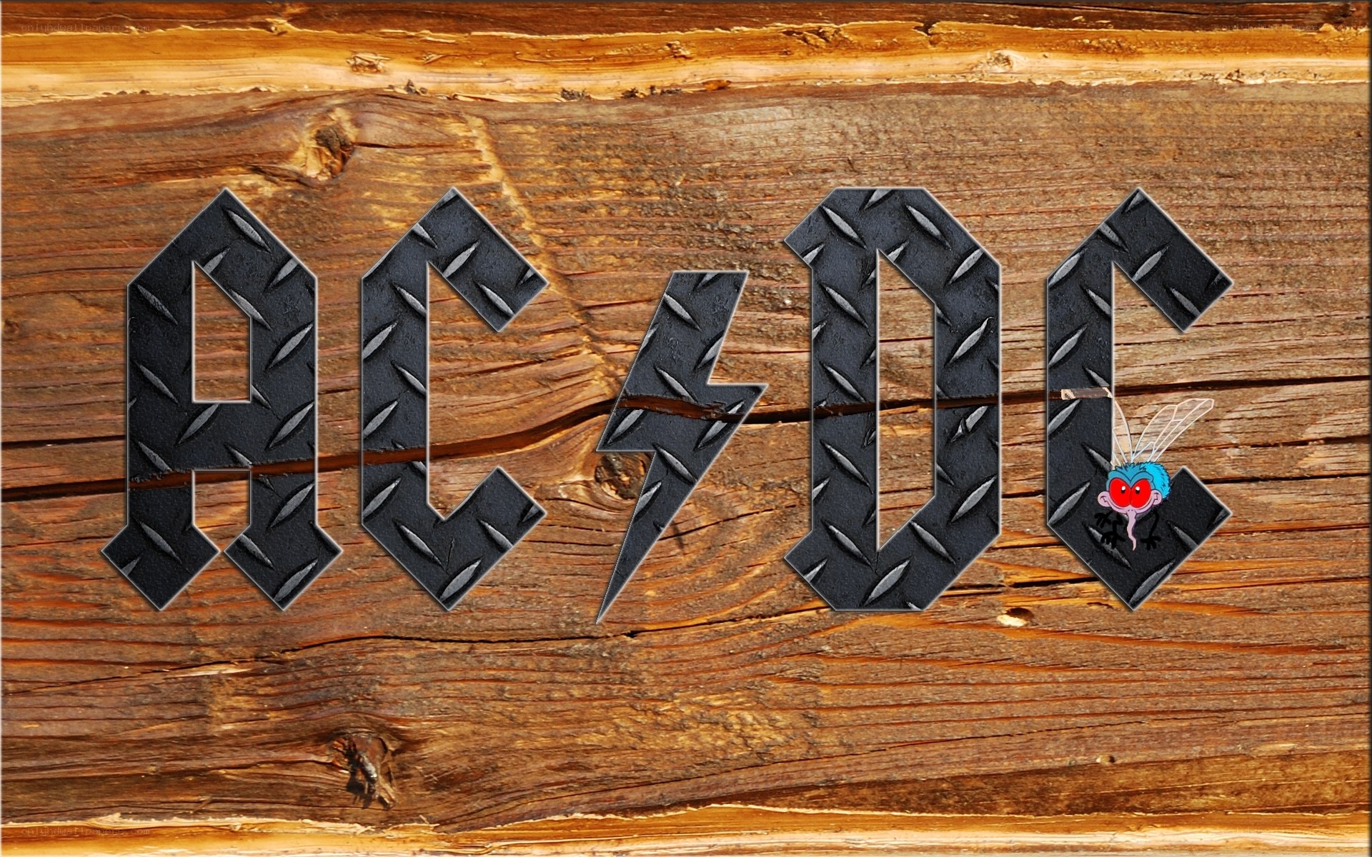 AC/DC logo on wood