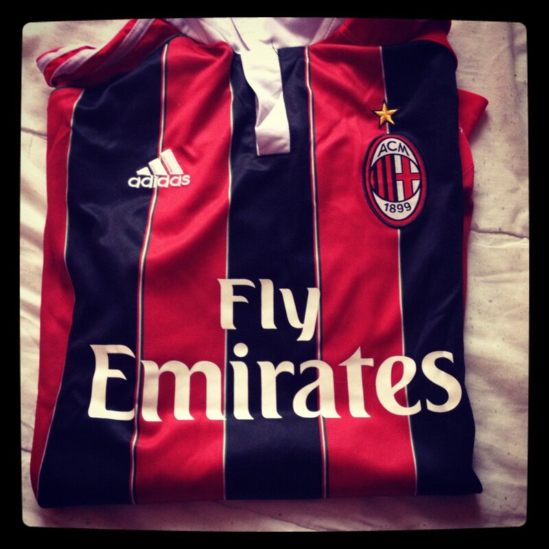 AC Milan jersey on bed