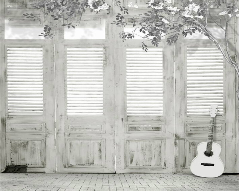 Acoustic Guitar Against Door