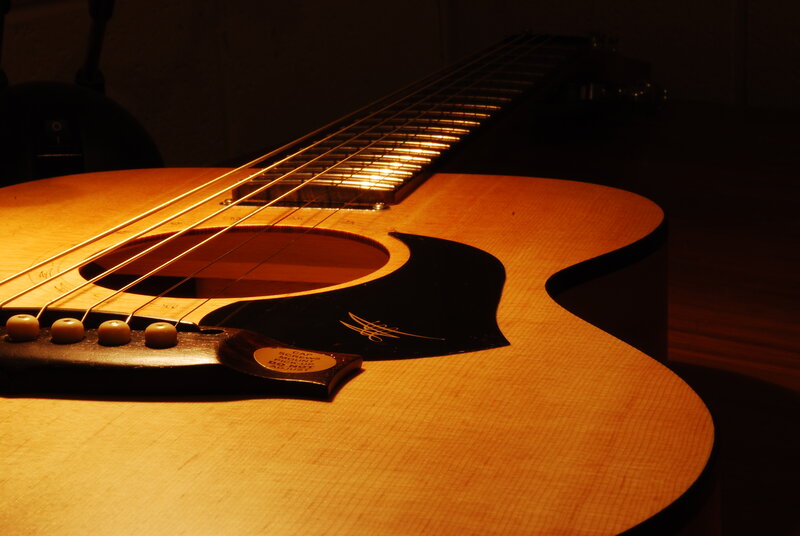Acoustic guitar in warm light
