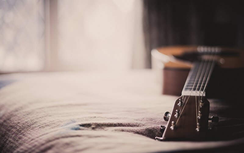 Acoustic Guitar on Bed — Brown, Calm, Morning, Photograph