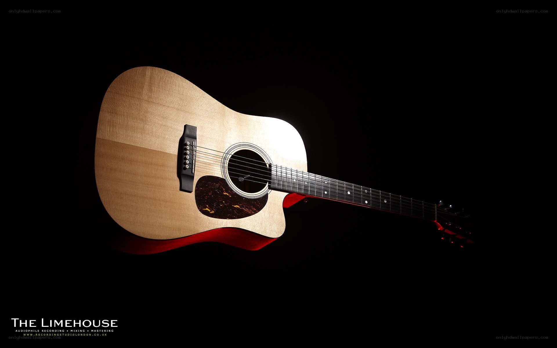 acoustic guitar on black background
