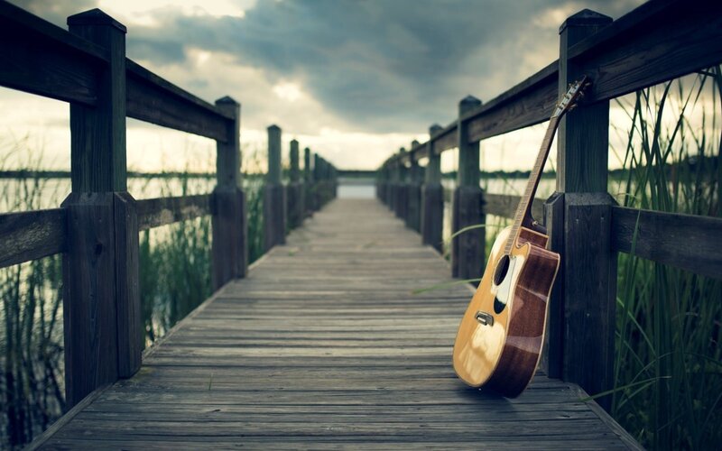 Acoustic Guitar on Dock