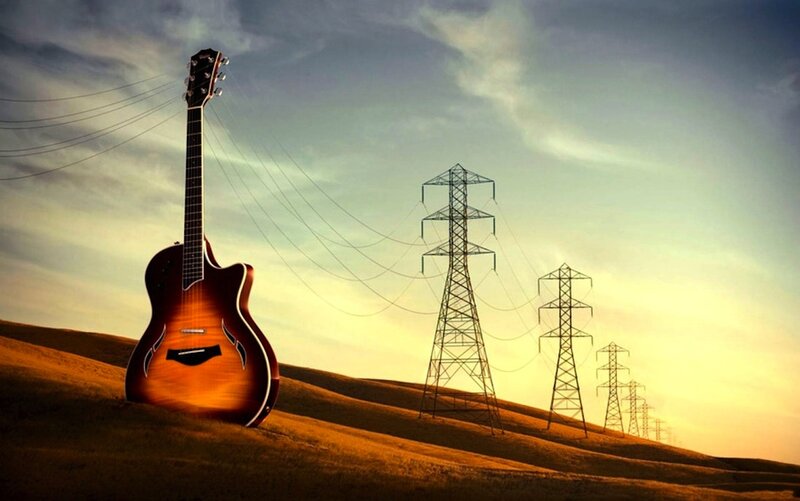 Acoustic Guitar on Hill — Brown