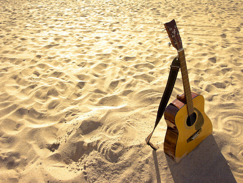Acoustic Guitar on Sand