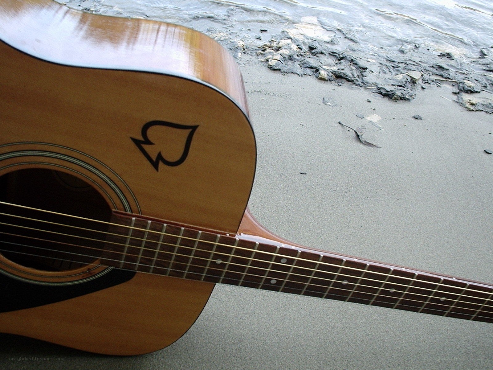 Acoustic guitar on the beach
