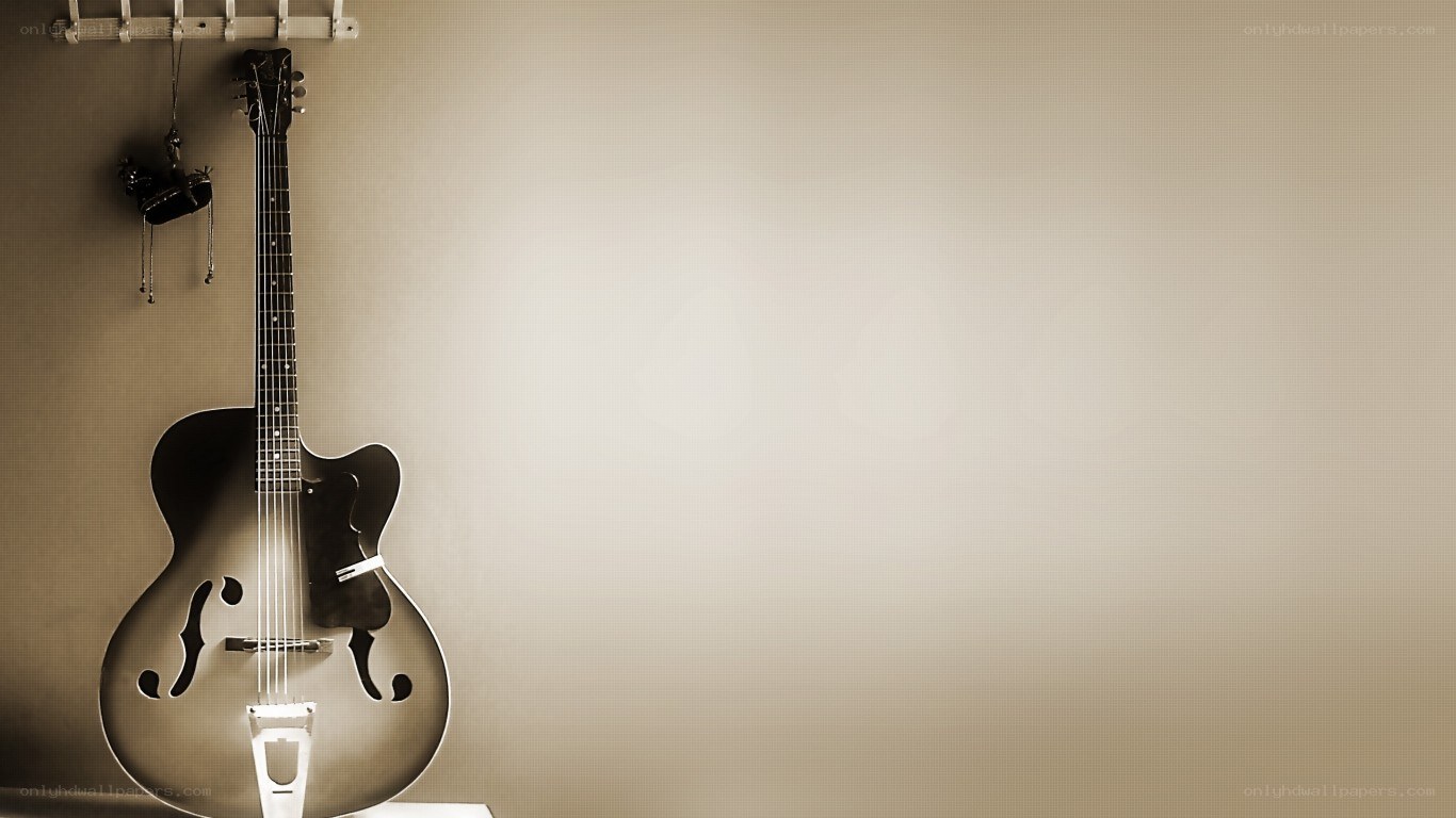 acoustic guitar on wall