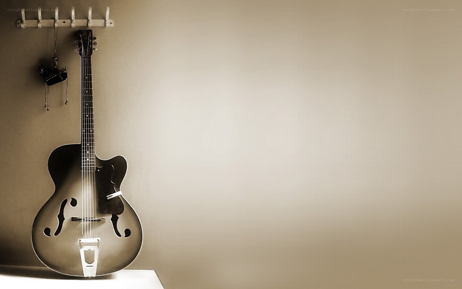 acoustic guitar on wall