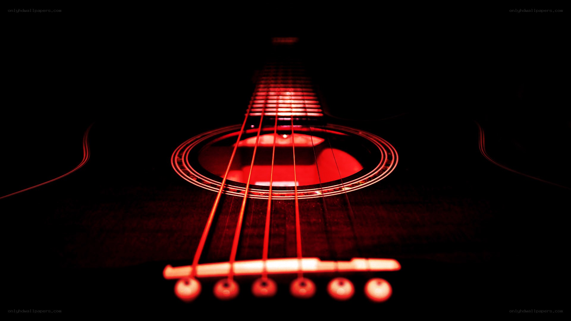Acoustic guitar with red lighting