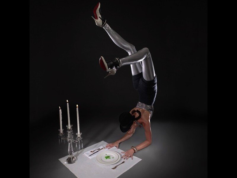 Acrobat at a dinner table