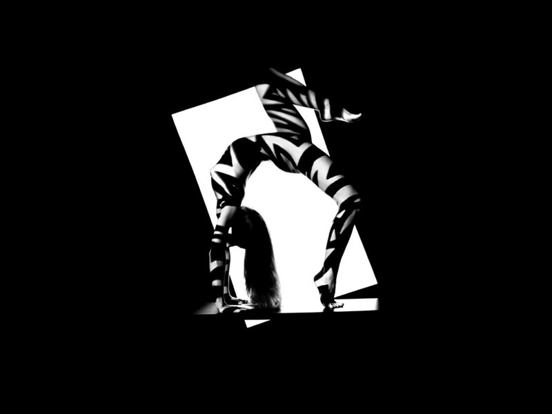 acrobatic dancer in stripes