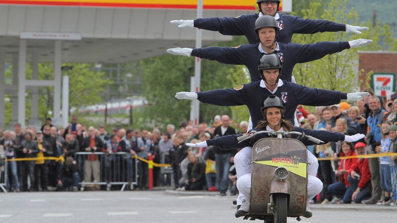 Acrobatic scooter stunt performance