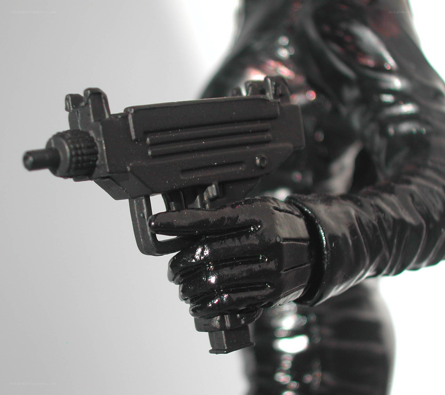 action figure holding gun