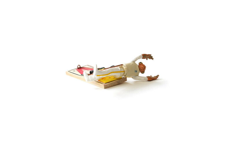 Action figure in a mousetrap