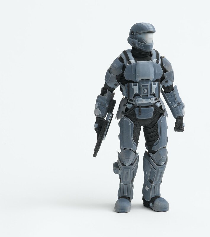 action figure in gray armor