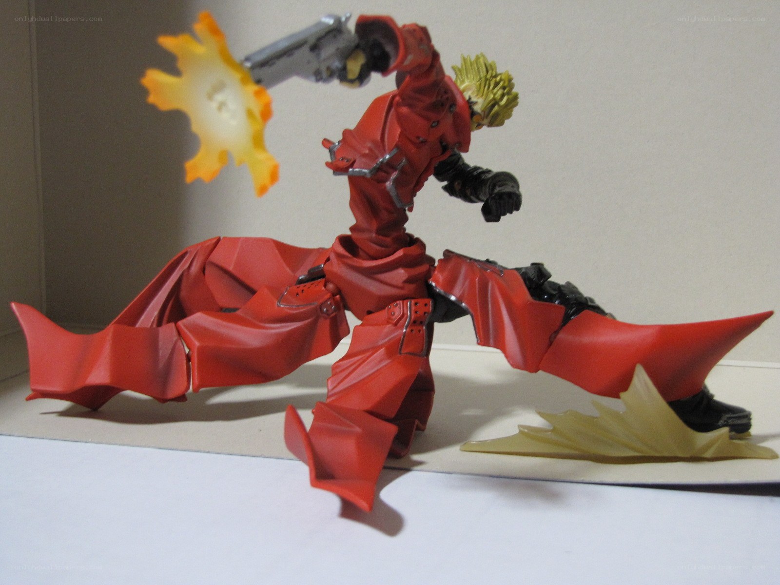 action figure in red cloak