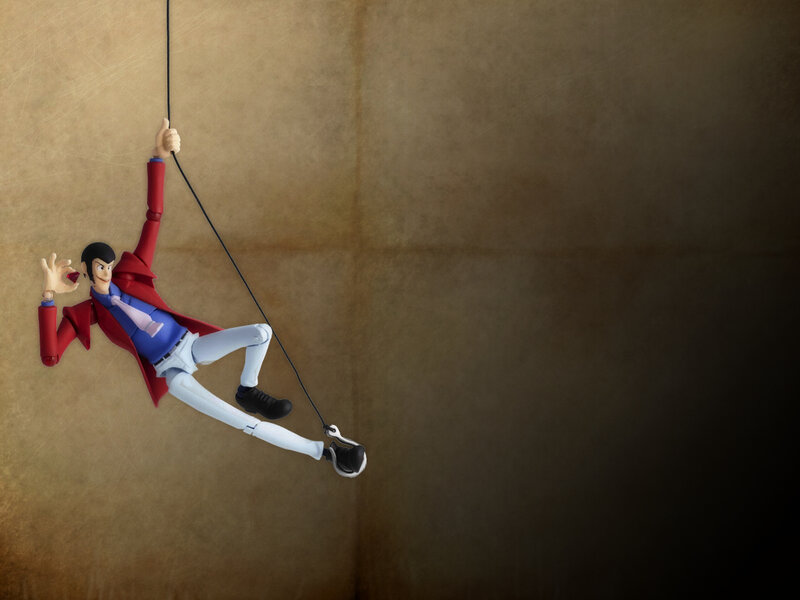 Action figure on rope