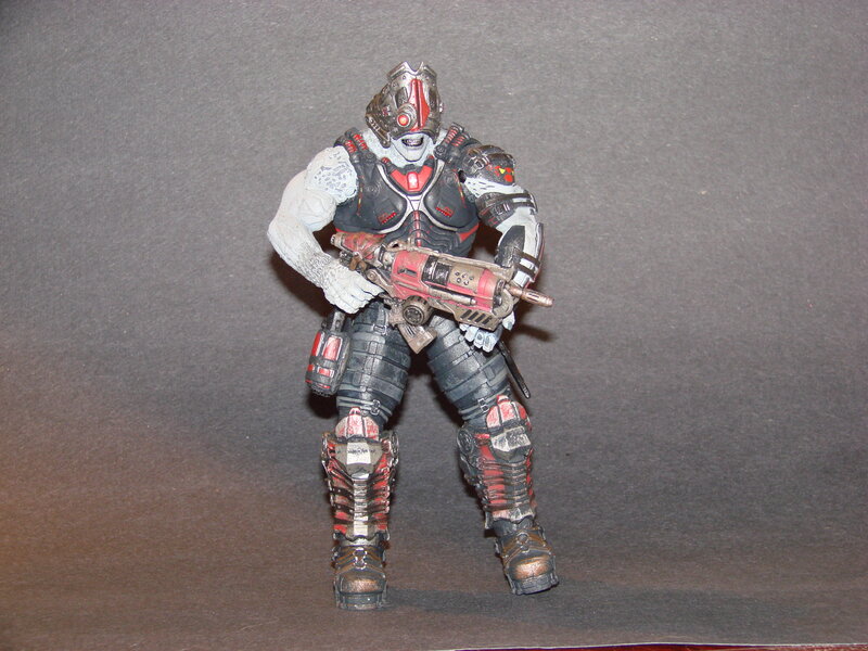 action figure with weapon