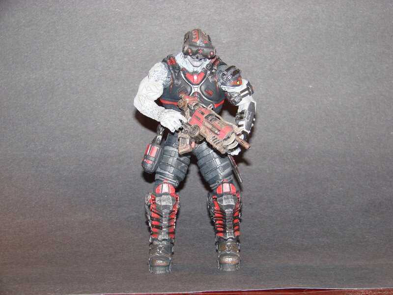 action figure with weapon
