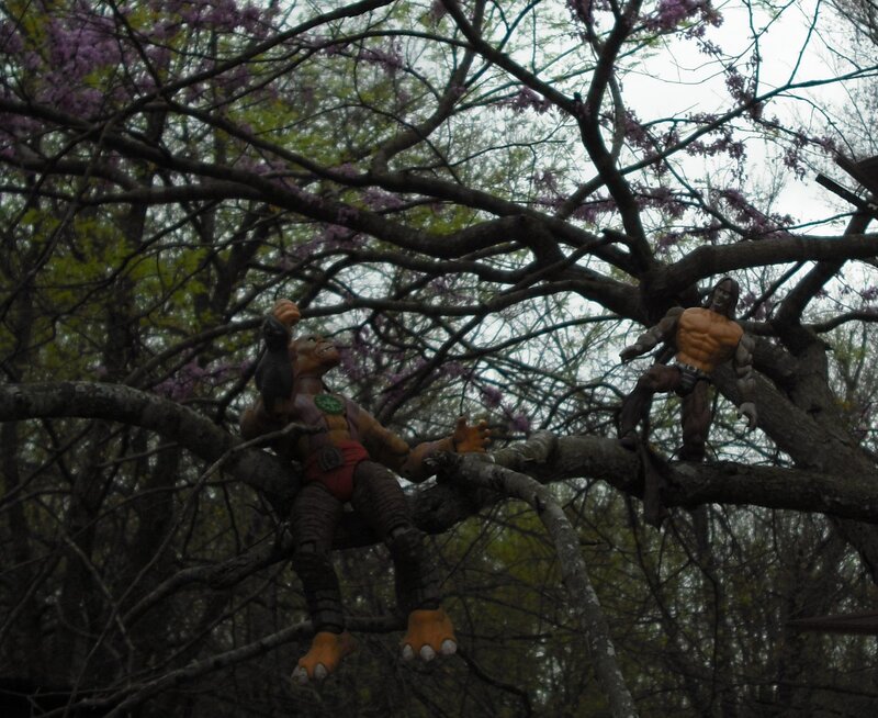 Action figures in a tree