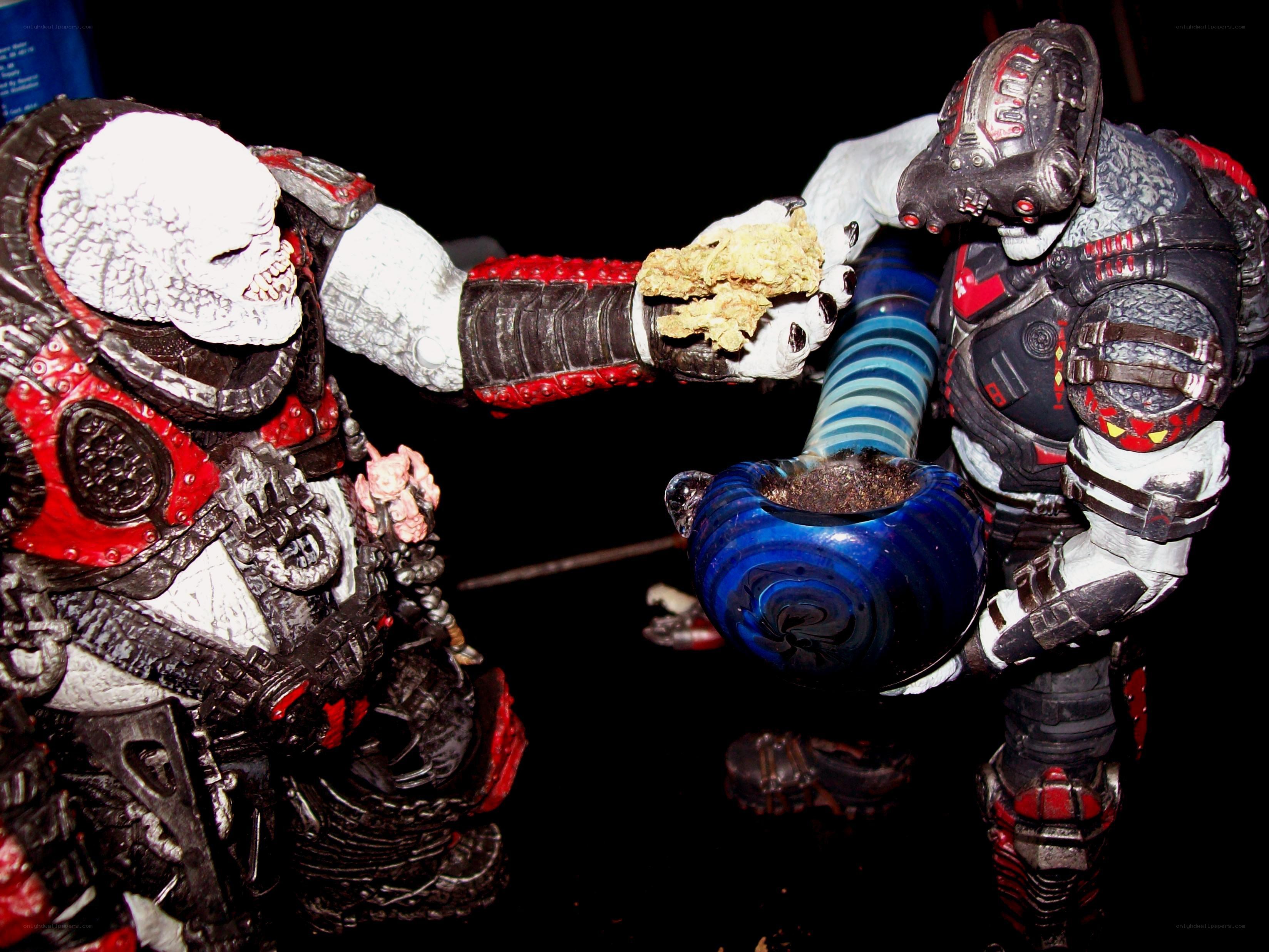 action figures sharing a pipe