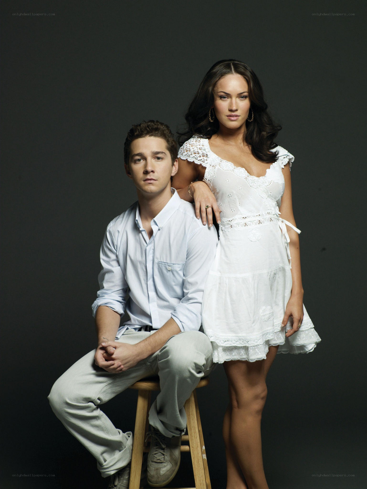 actor duo in white attire