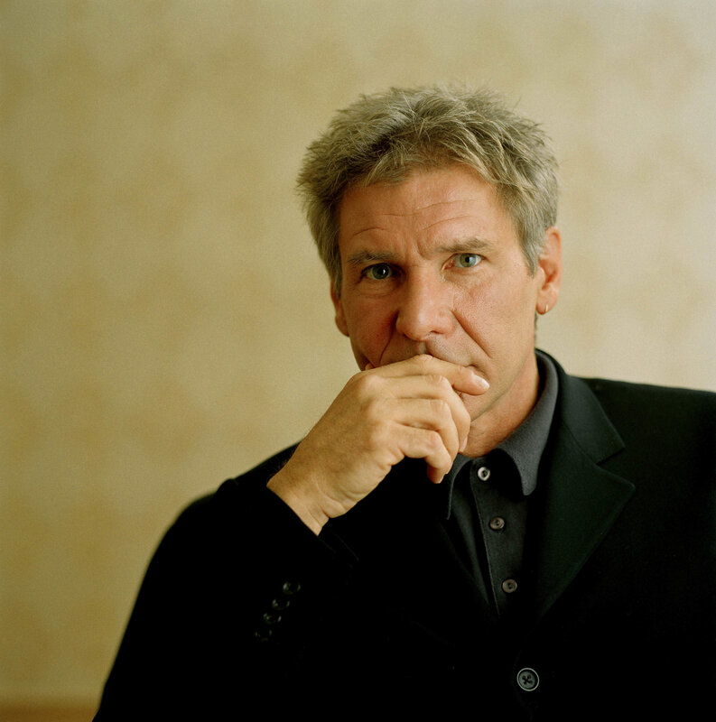 actor in black suit