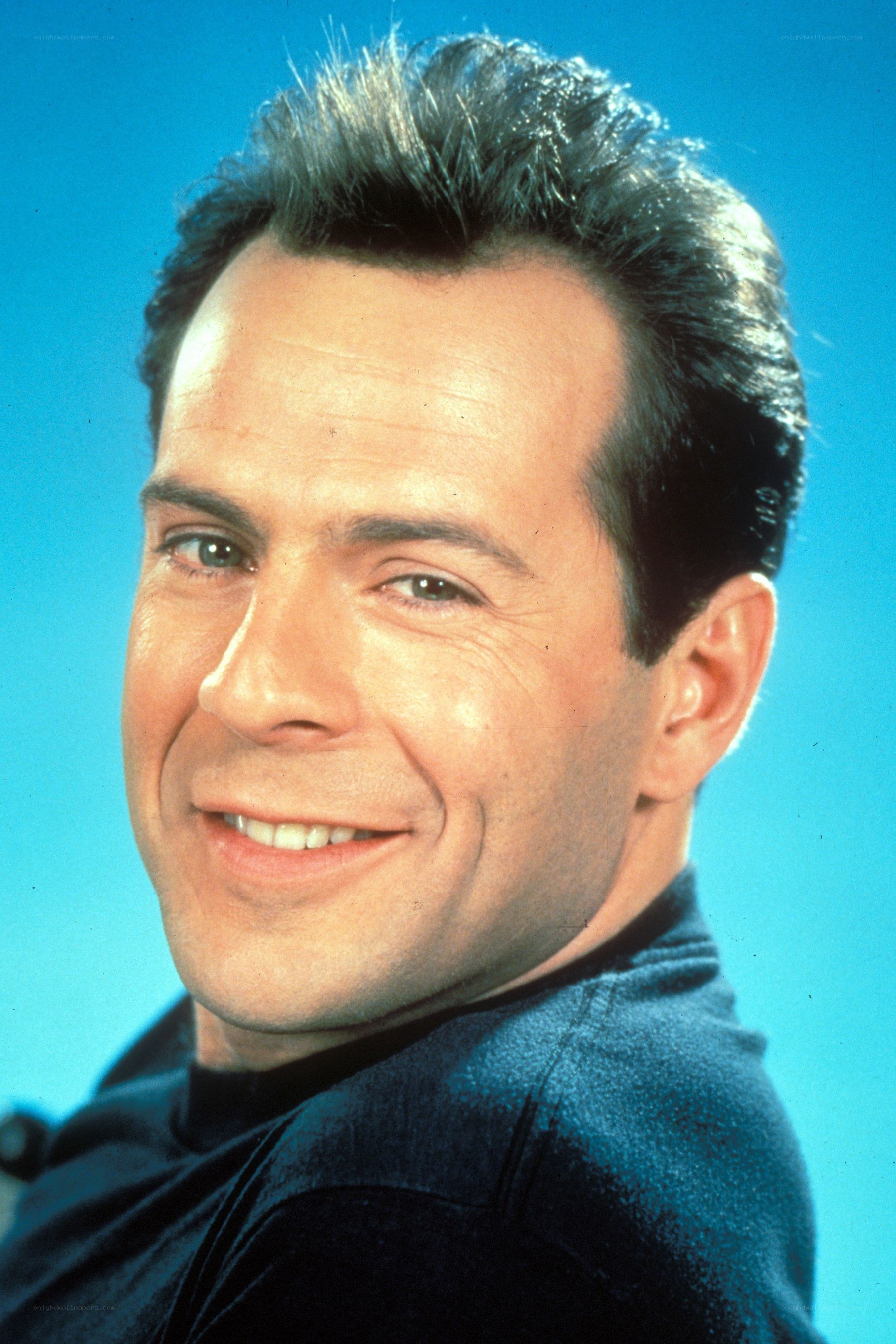 actor in blue shirt