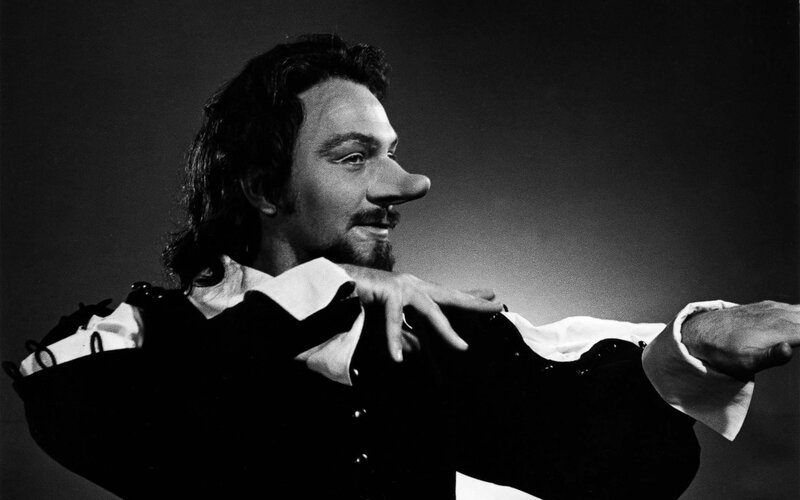 actor in costume with exaggerated nose