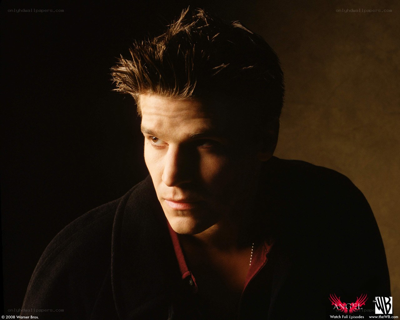 actor in dark coat