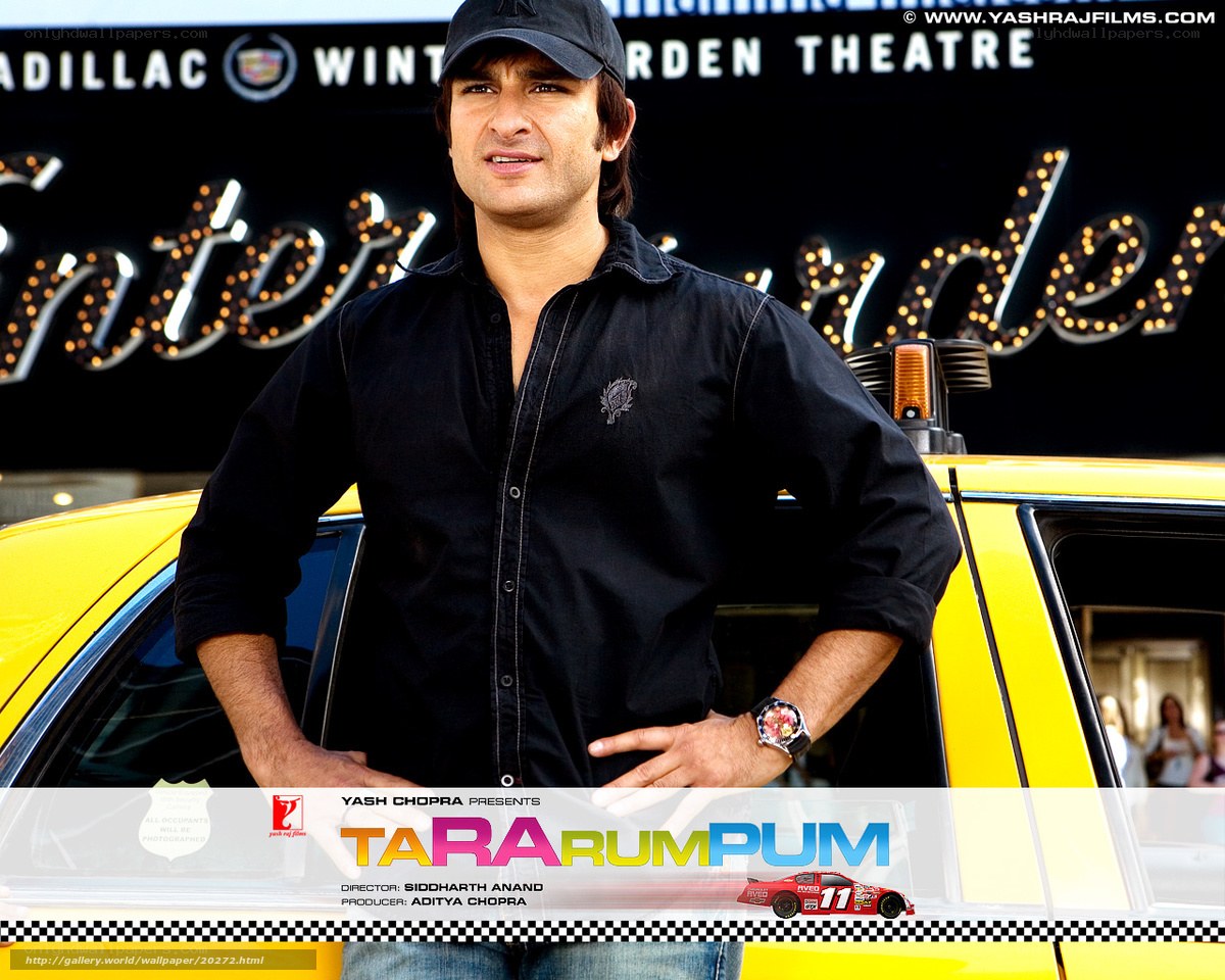 Actor in front of yellow car