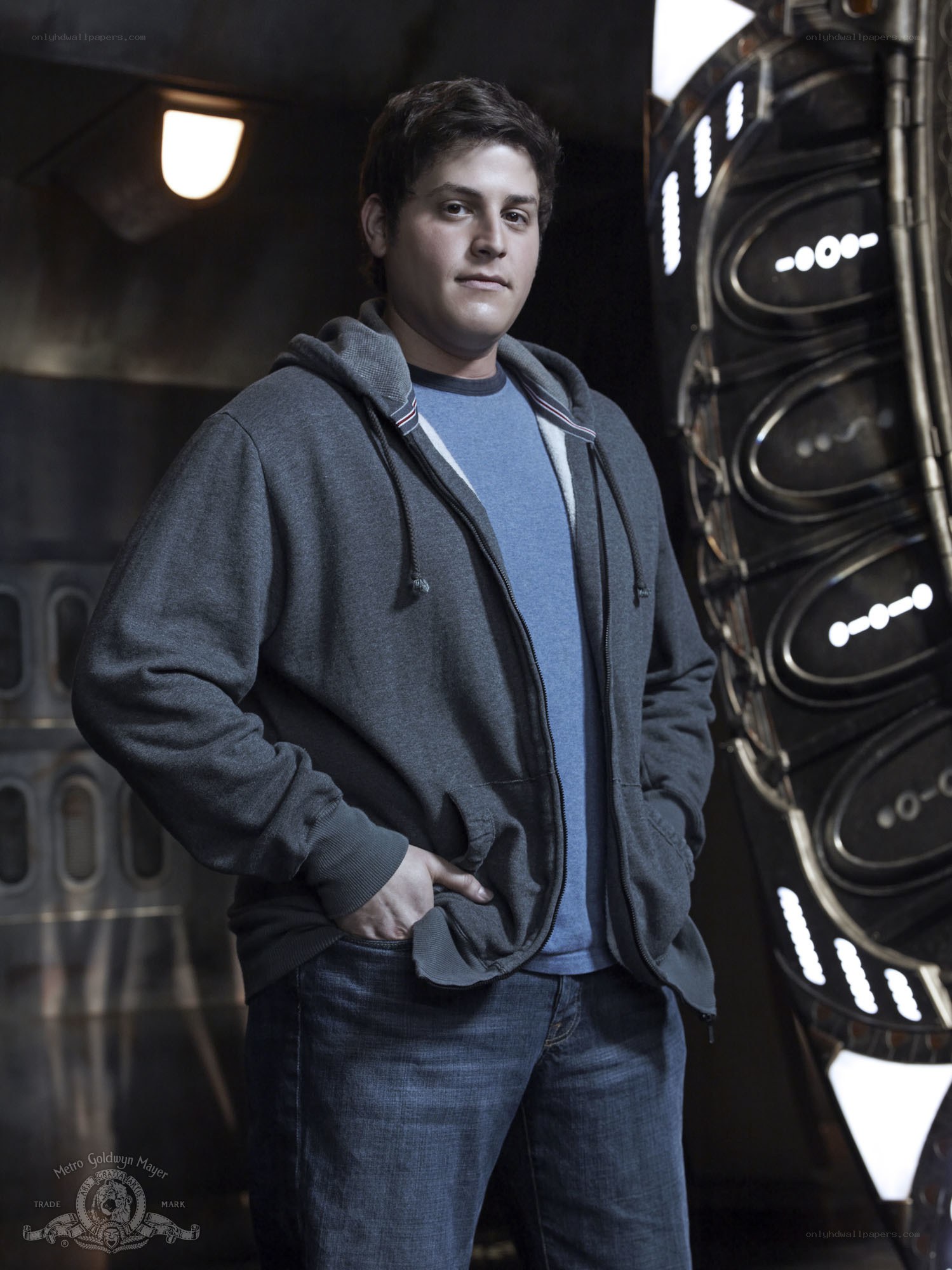 actor in hoodie on set