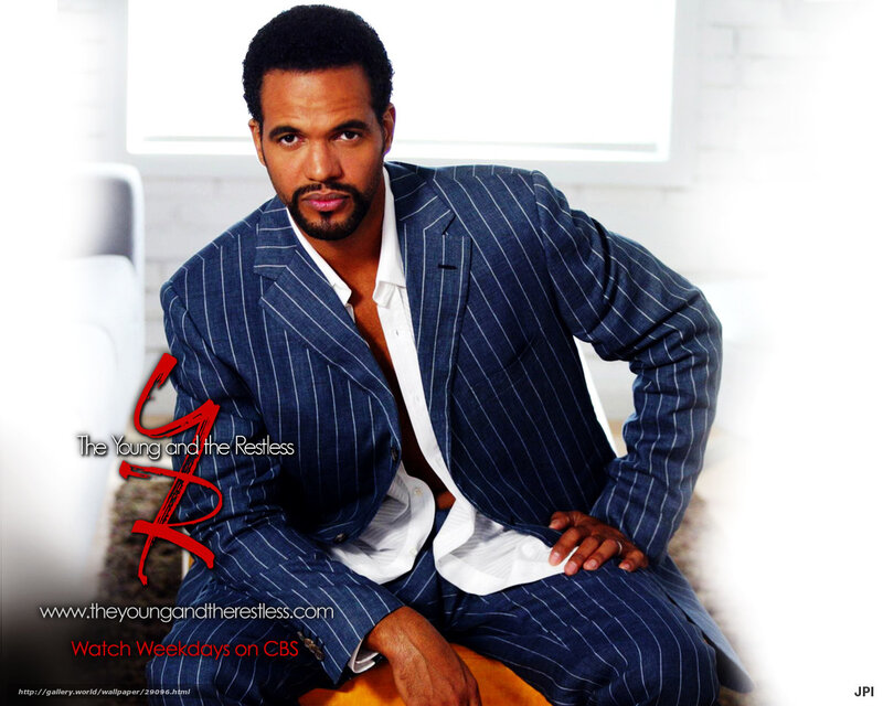 actor in pinstripe suit