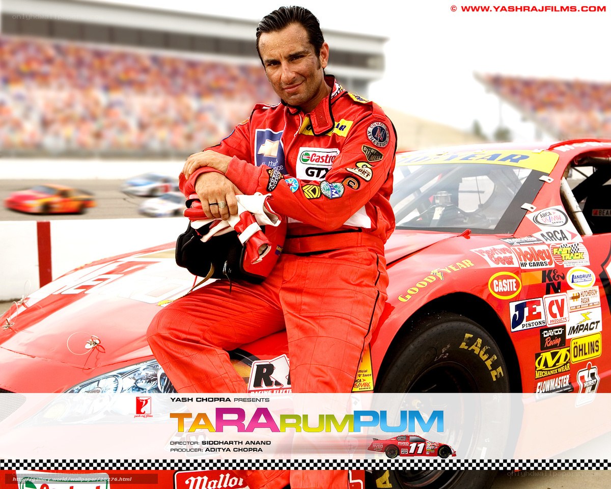 Actor in racing suit with car