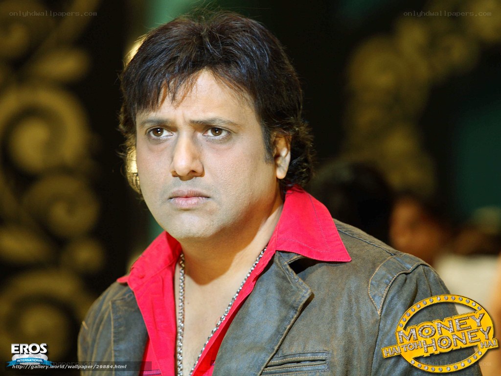 actor in red shirt and jacket